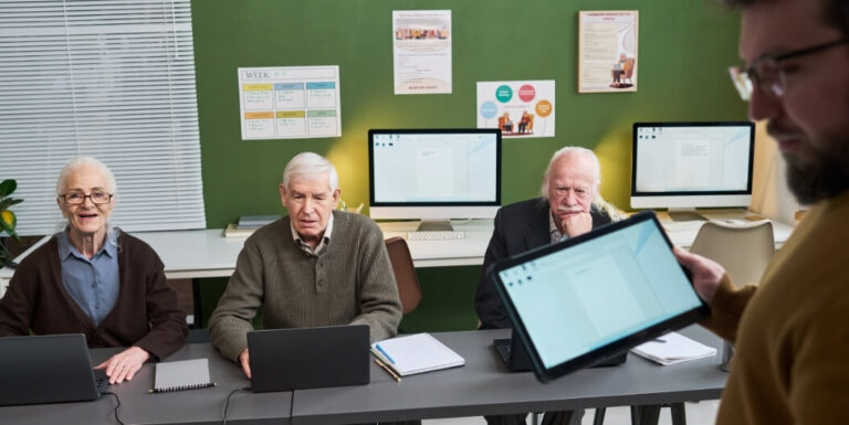 Elderly Residents Learning Tablet Skills during a Technology Class at Assisted Living Facility