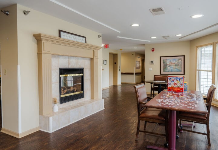 Common Area with a Fireplace at an Assisted Living Community Common Area with a Fireplace at an Assisted Living Community