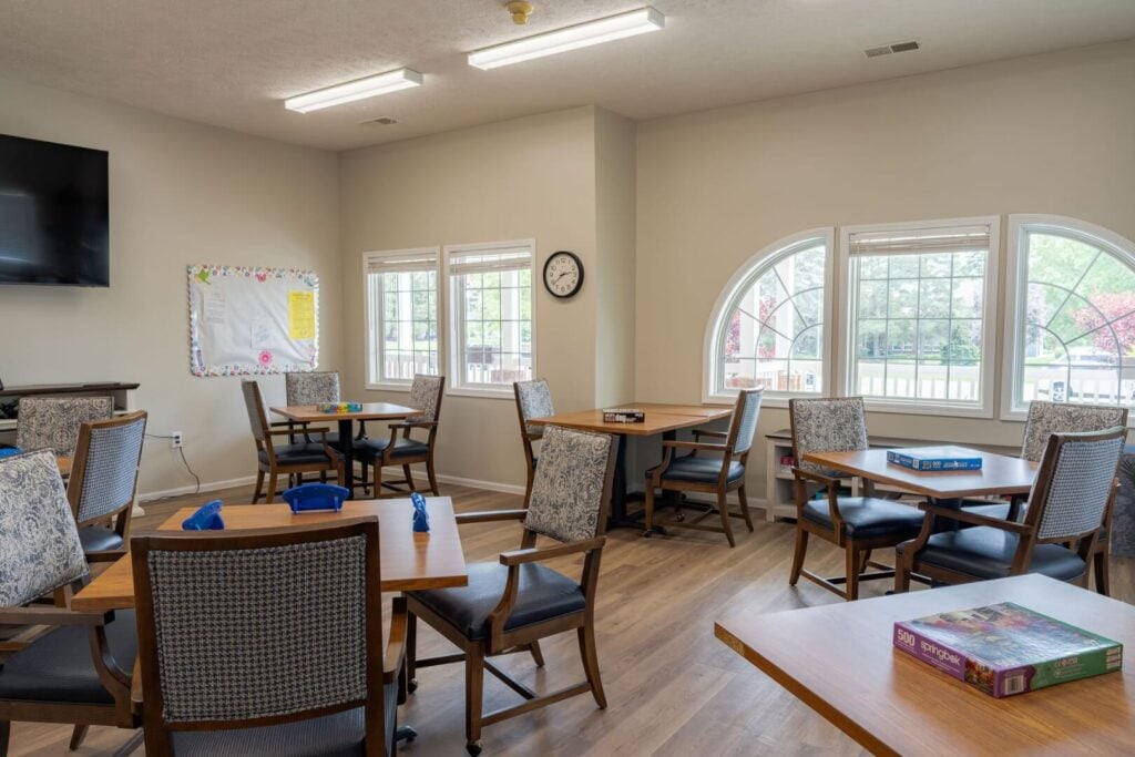 Activity Room with Game Tables and Puzzles at an Assisted Living Community