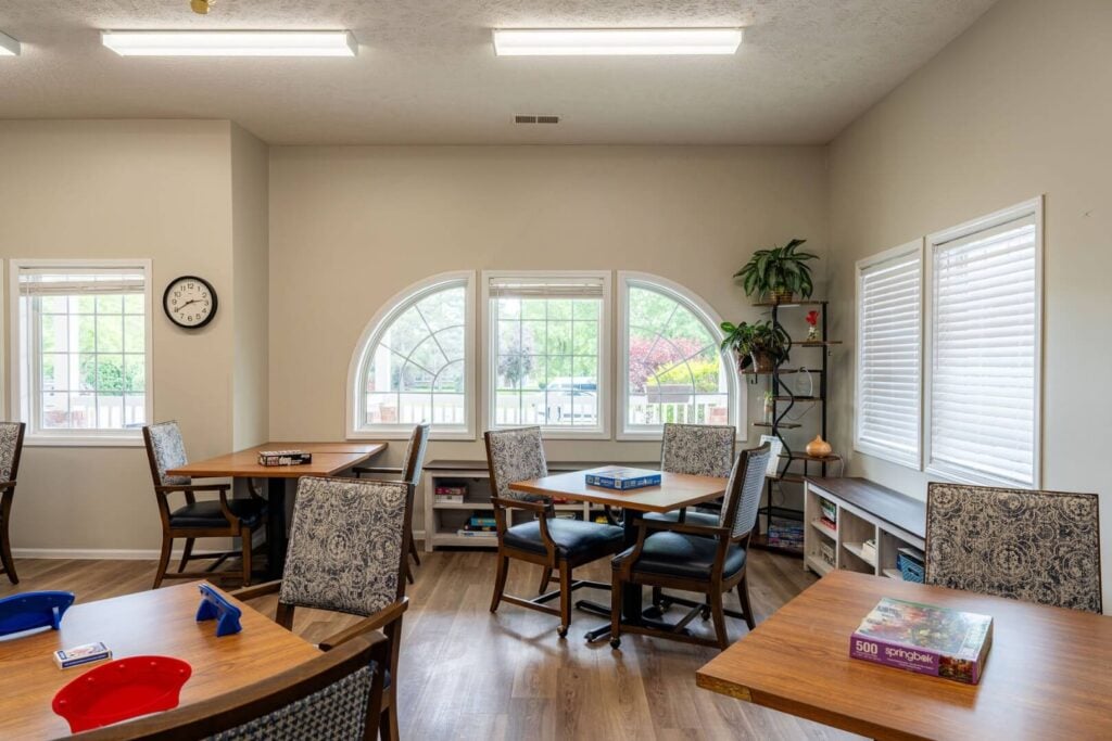 Bright Activity Space with Arched Windows at an Assisted Living Community