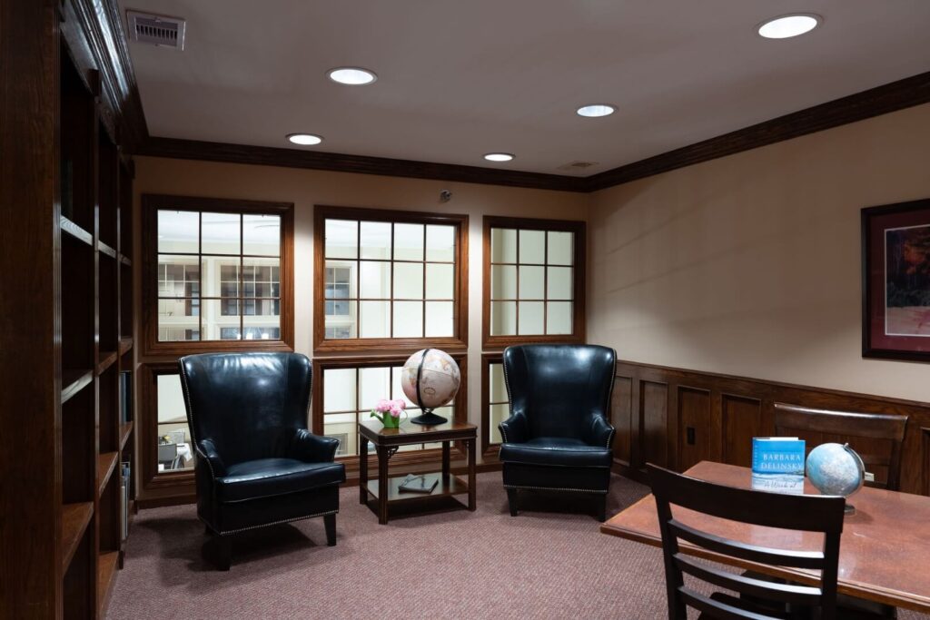 Quiet Reading Room with Leather Chairs at an Assisted Living Community