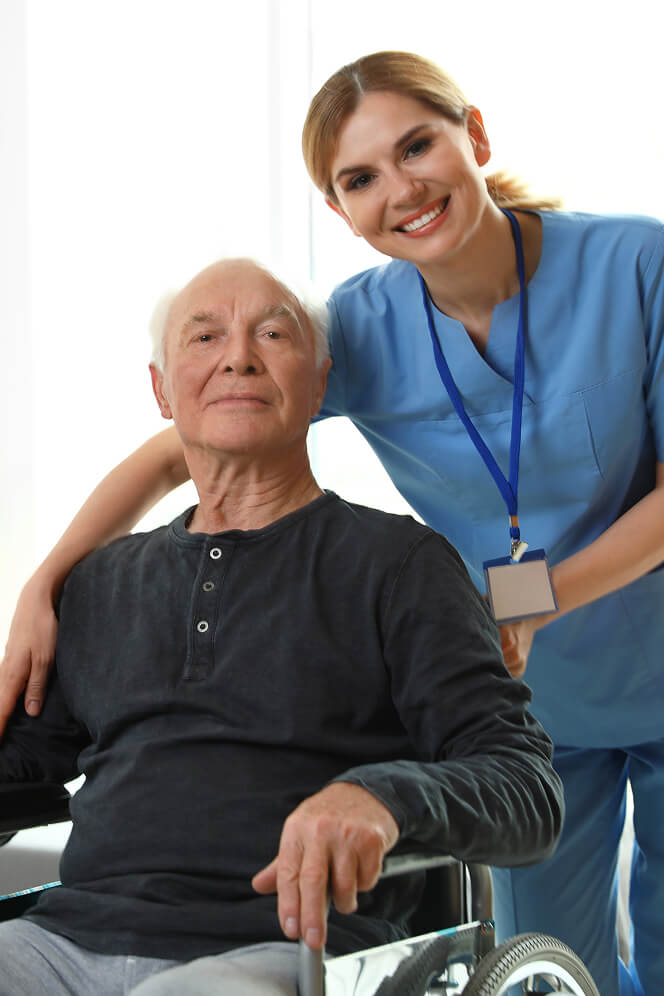 Nurse Comforting Elderly Woman at Nursing Home Colleyville